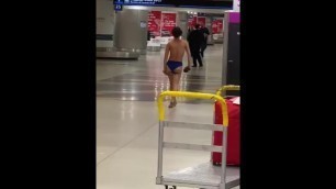 Woman Strips at Miami Airport 1