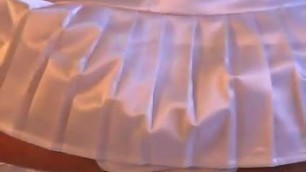 Jesse teases in white satin skirt and panties