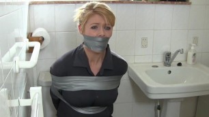 Blonde housewife in bathroom